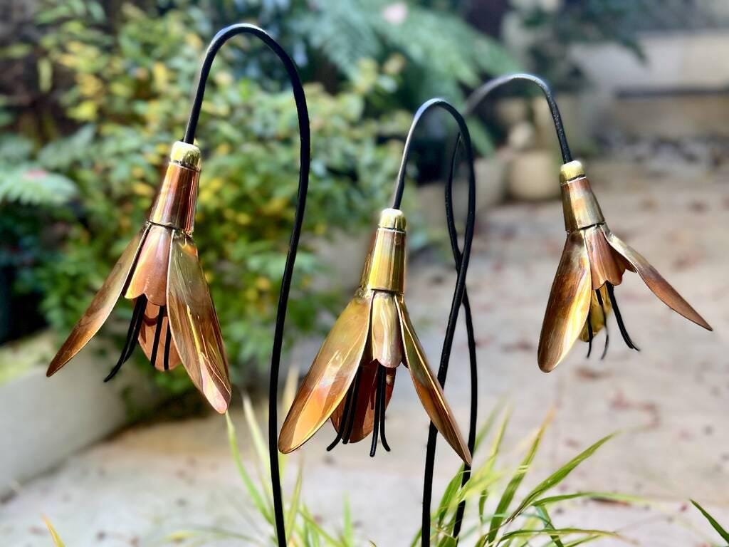 where to buy metal garden sculptures